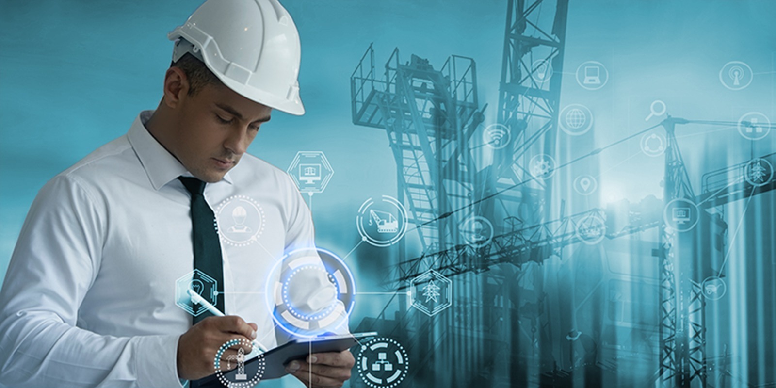 An project manager in a white hard hat holding a tablet with futuristic digital overlays of industrial symbols and connectivity icons, superimposed on an image of silhouetted cranes and construction framework in a blue-toned setting.
