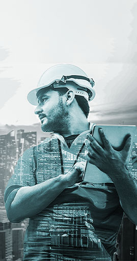 A construction worker wearing a hard hat and a high-visibility vest holding a clipboard and pen with a city skyline overlaid on the image.